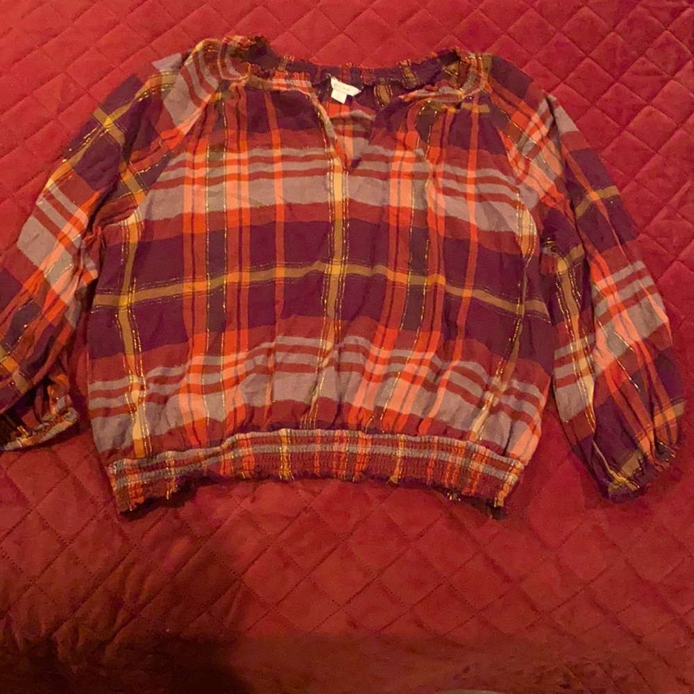Plaid shirt with different shades of red. Size Large brand est. 1946